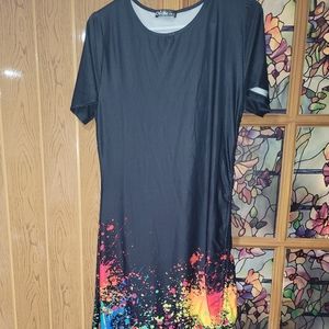 Strecht dress black with color sz large open leg and ringling in the side